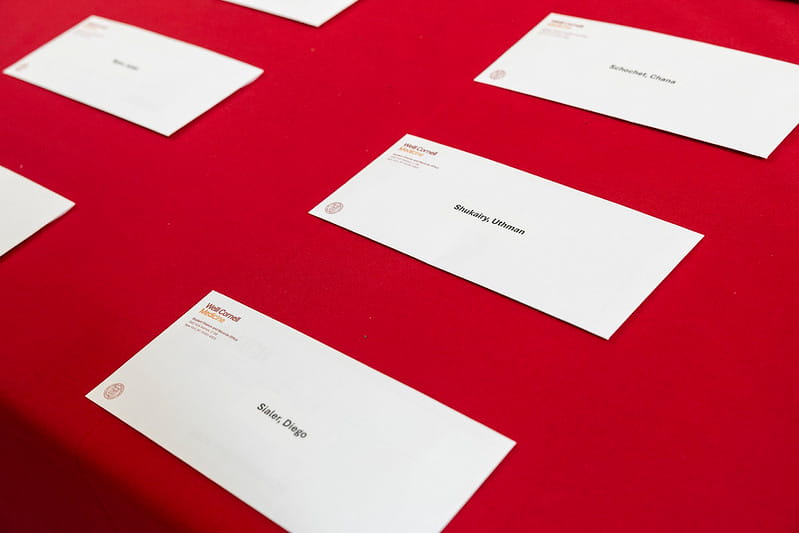 Weill Cornell Medicine Match Day 2026 residency match envelopes arranged on a red table before the Class of 2026 ceremony