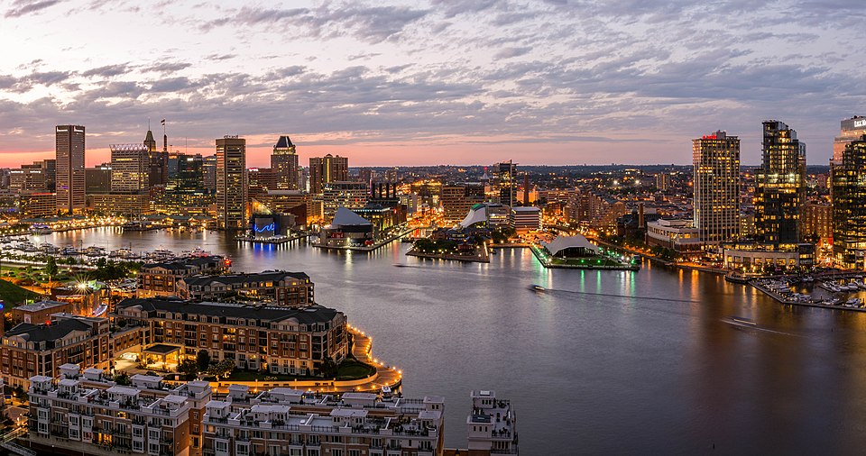 altimore Inner Harbor skyline at dusk, the city where Johns Hopkins Medicine residents begin residency training and select their GSI disability benefit amount